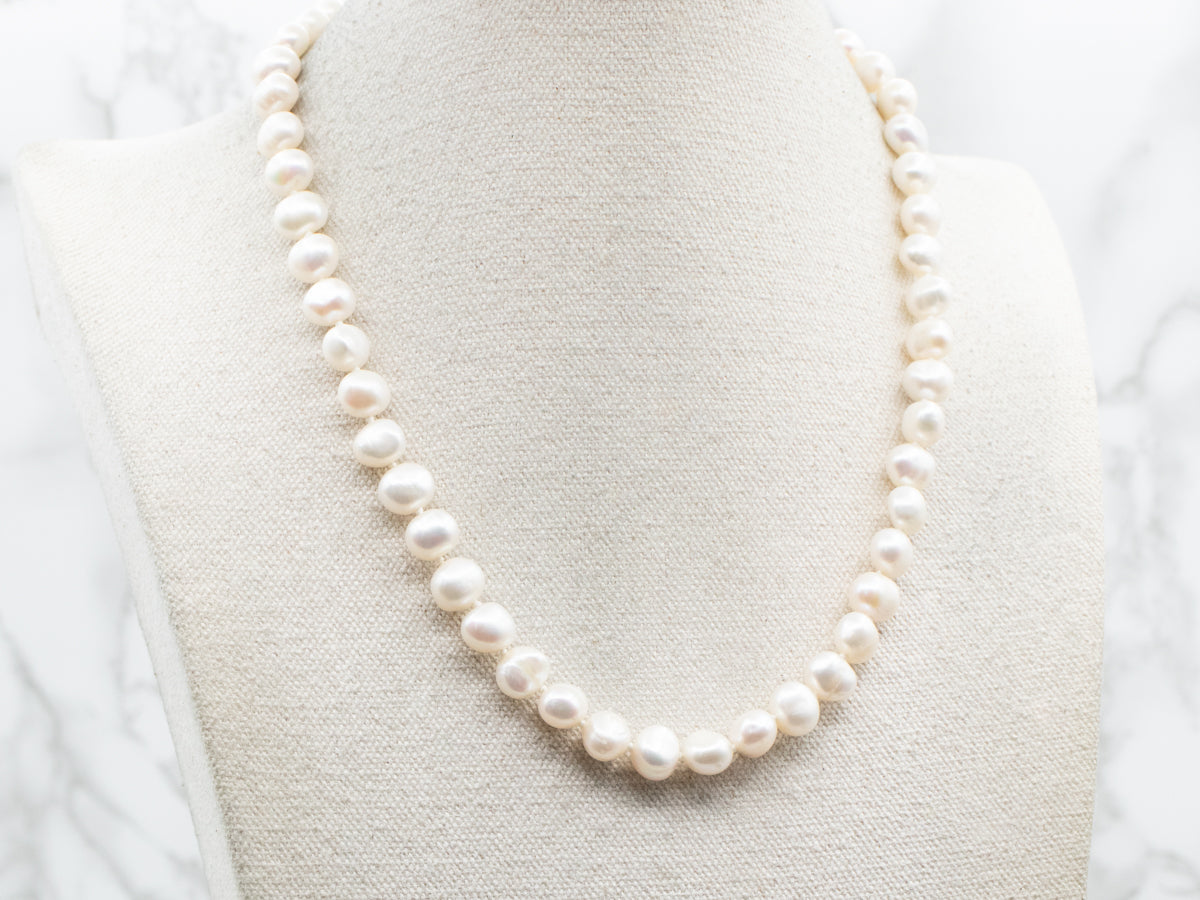 Collar de perlas de agua dulce en oro amarillo