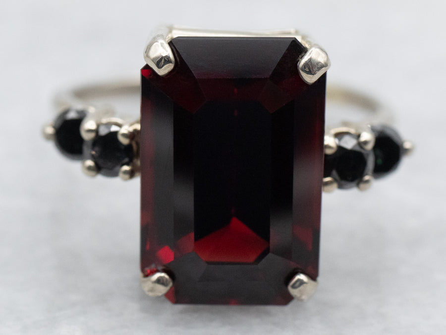 White Gold Emerald Cut Garnet Ring with Black Diamond Accents