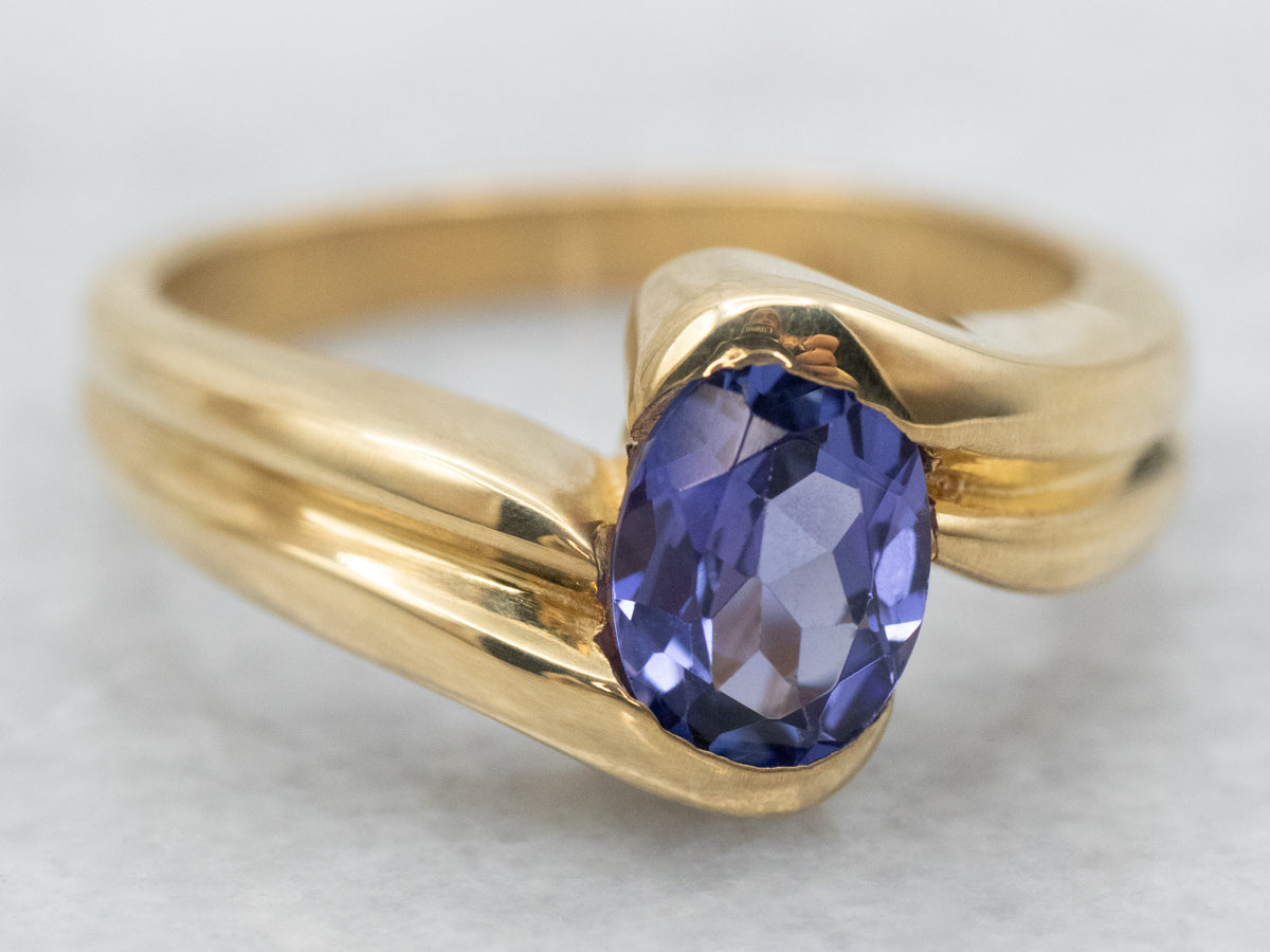 Modern 18-Karat Gold Tanzanite Bypass Ring