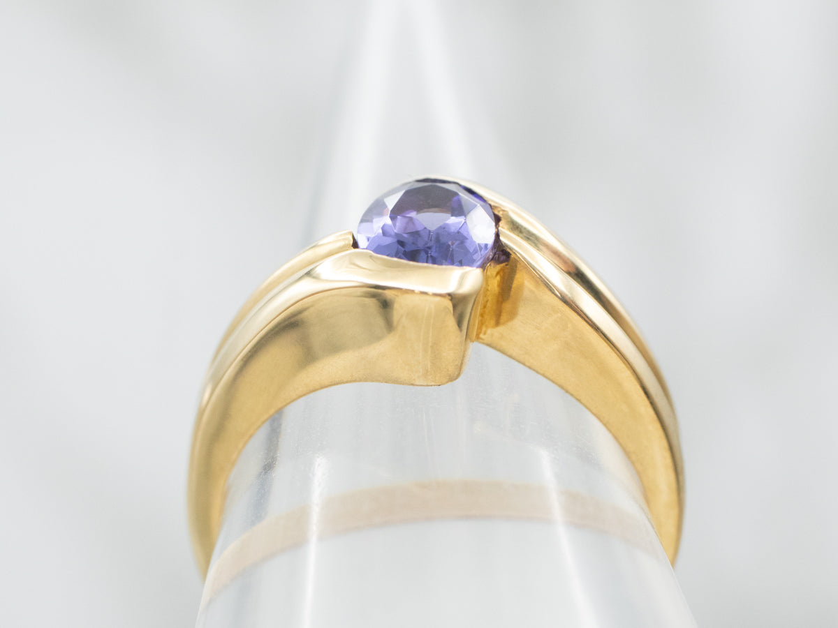 Modern 18-Karat Gold Tanzanite Bypass Ring