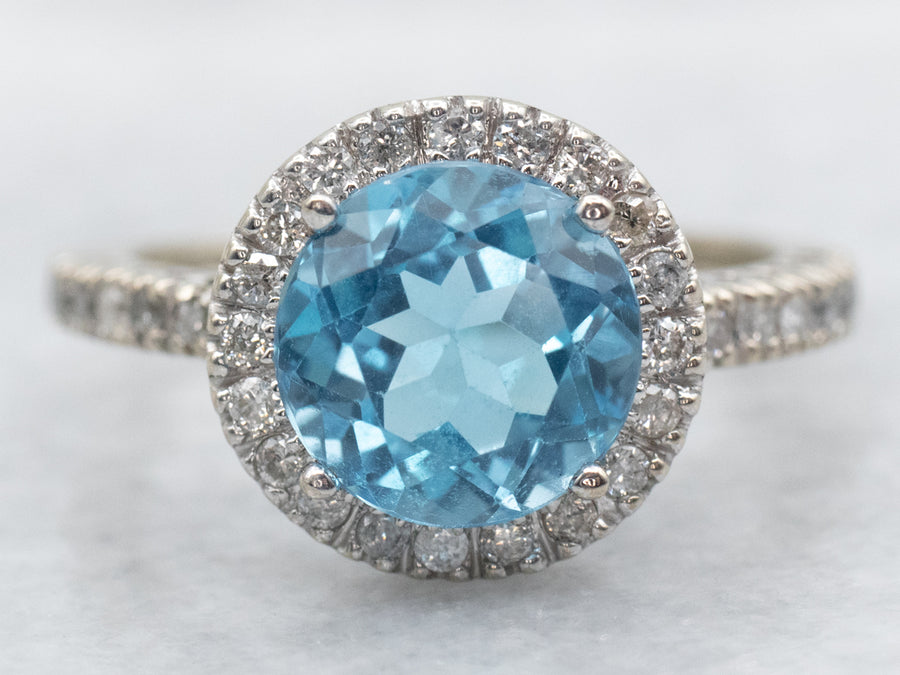 Modern White Gold Blue Topaz and Diamond Halo Ring