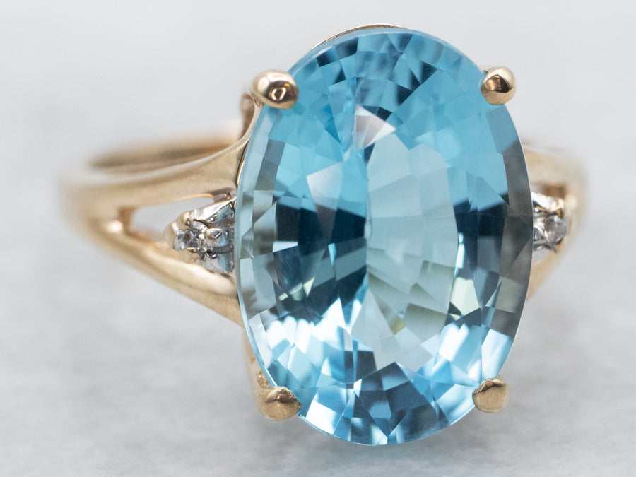 Gold Blue Topaz and Diamond Ring