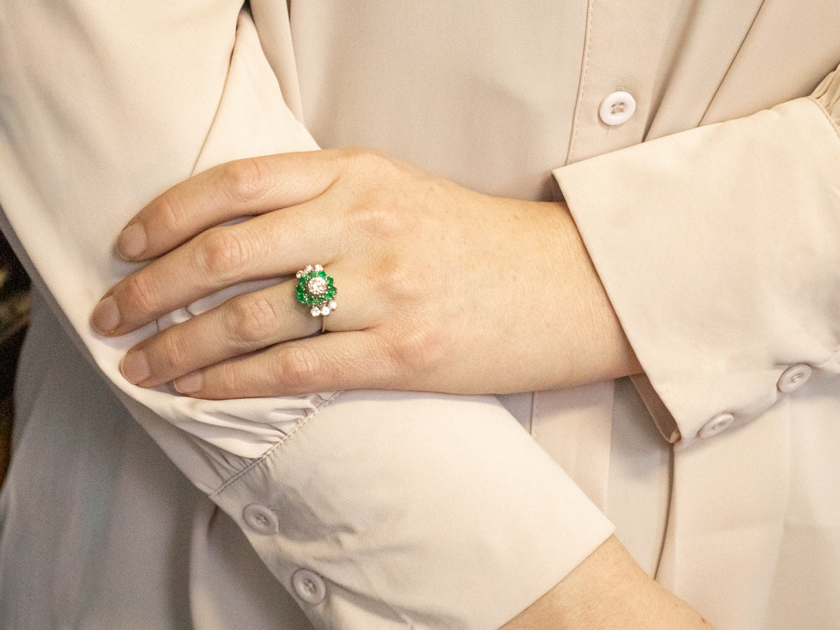 Modern Diamond and Emerald Halo Engagement Ring