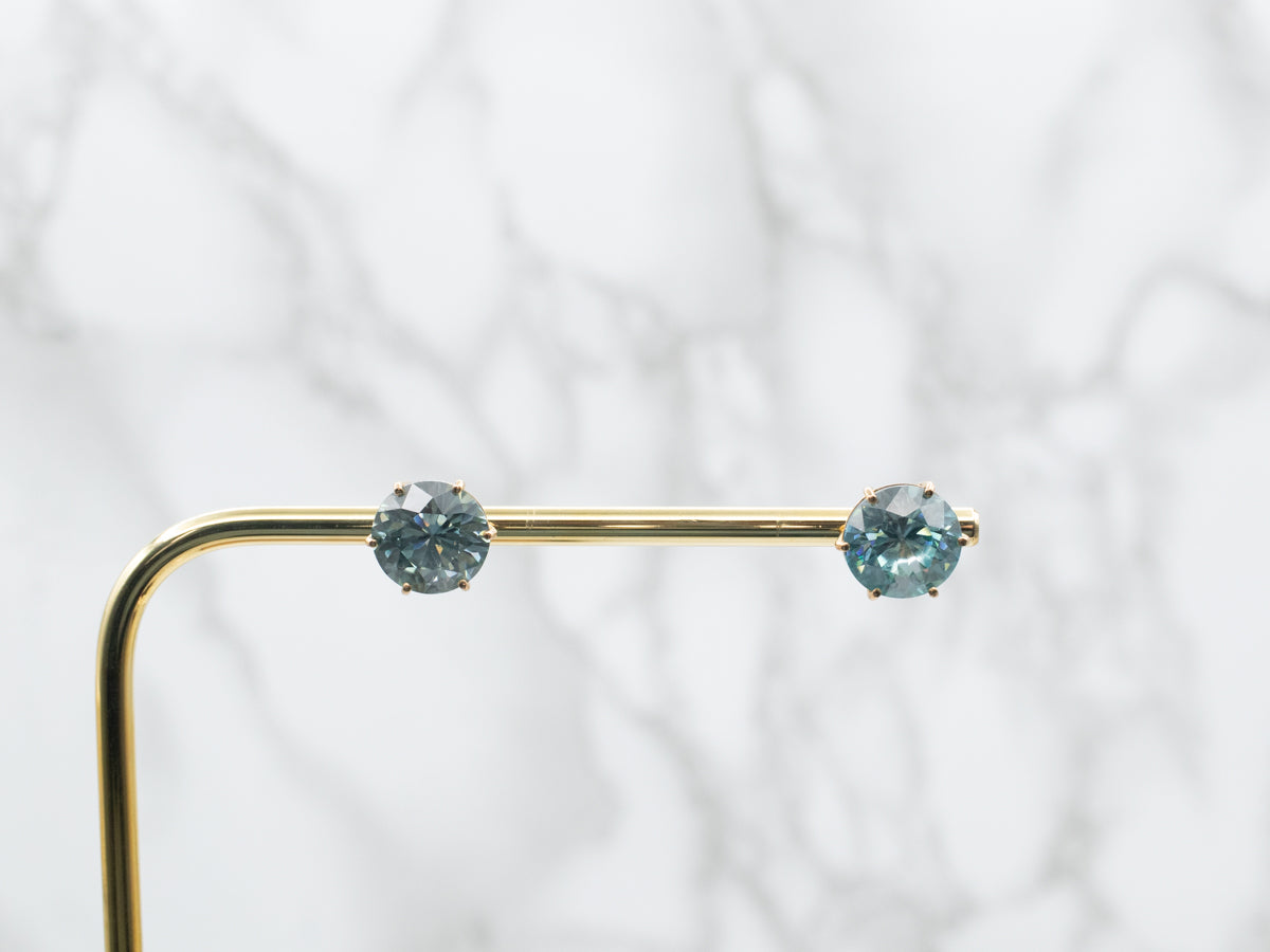 Round Cut Blue Zircon Stud Earrings