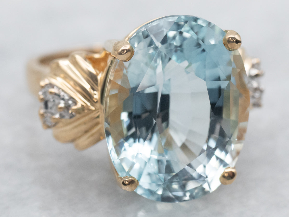 Blue Topaz Cocktail Ring with Diamond Accents