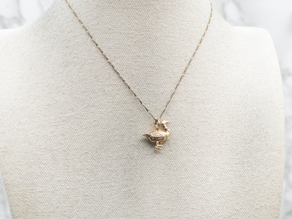 The Goose with the Golden Egg Charm