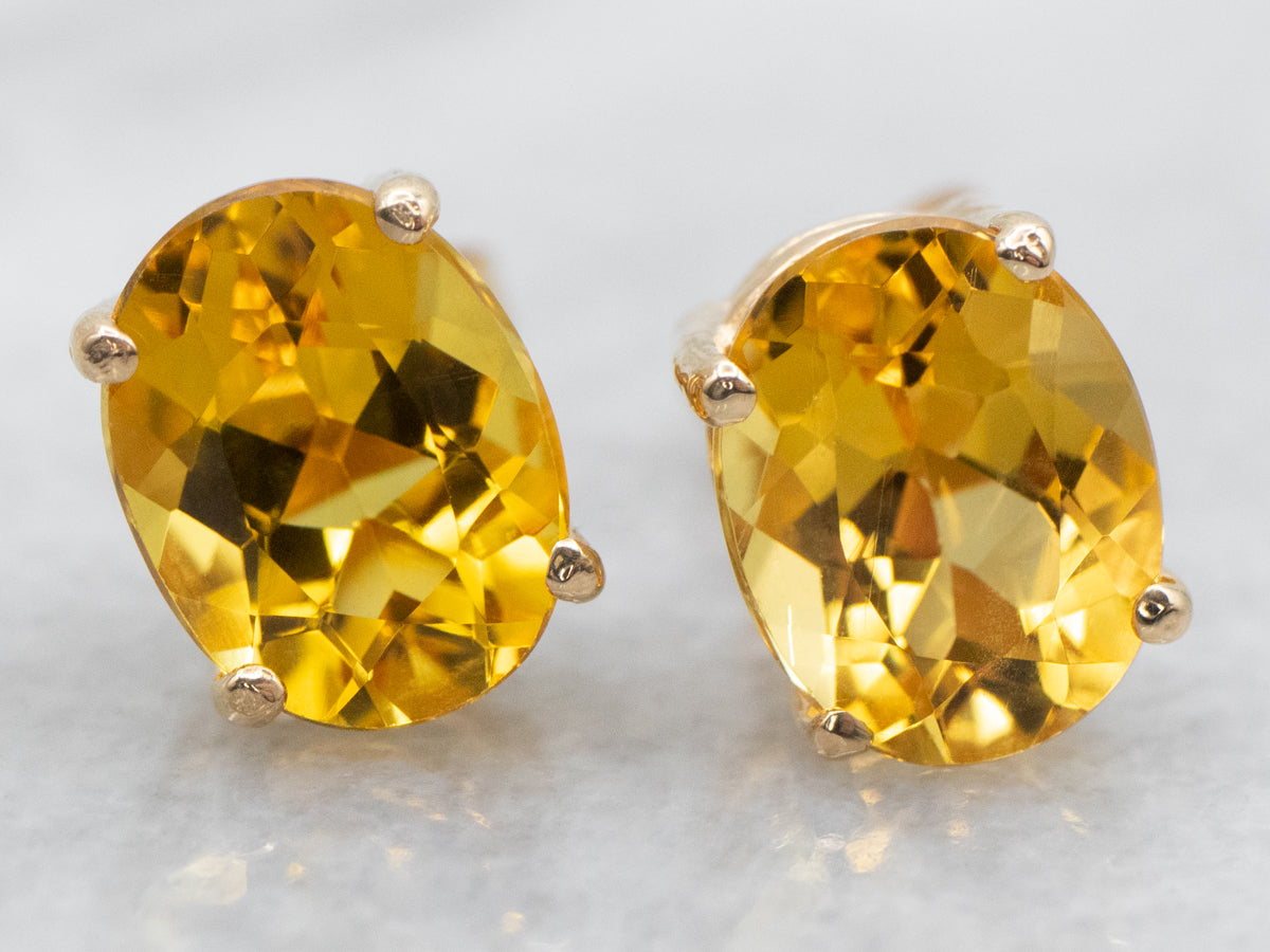 Oval Cut Yellow Beryl Stud Earrings