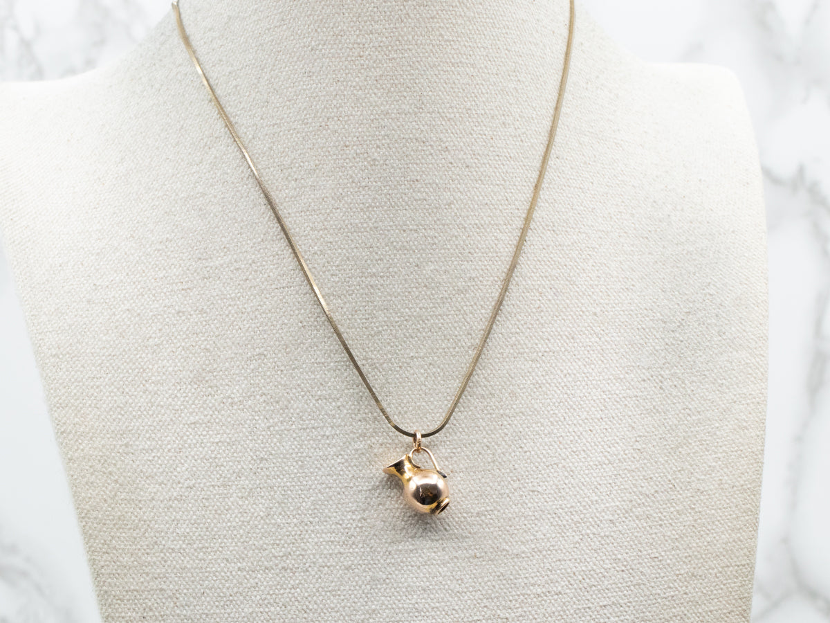 Charm de jarra de oro