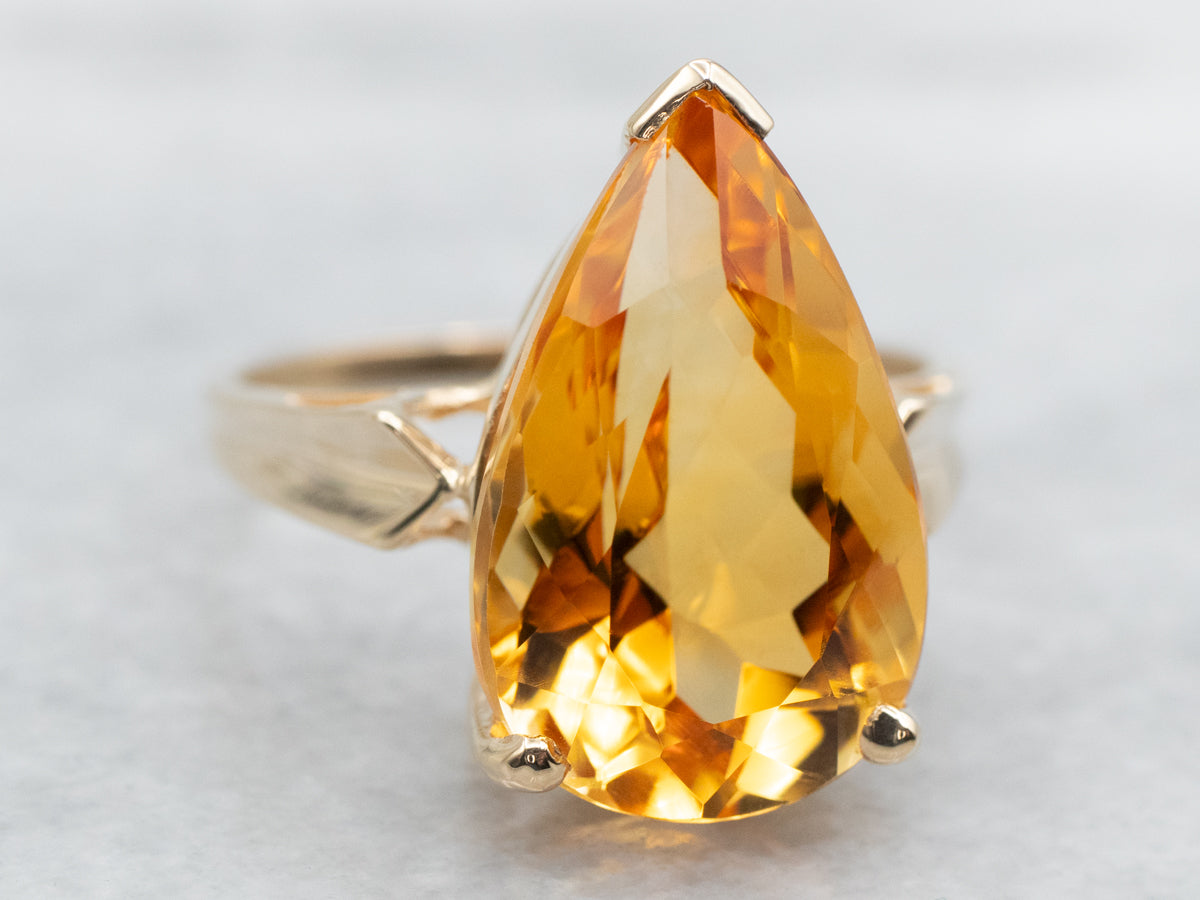 Pear-Cut Citrine Solitaire Ring in Yellow Gold