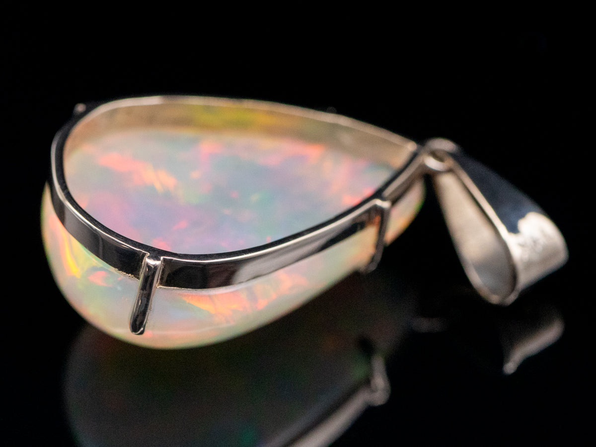 White Gold Pear Cut Opal Solitaire Pendant