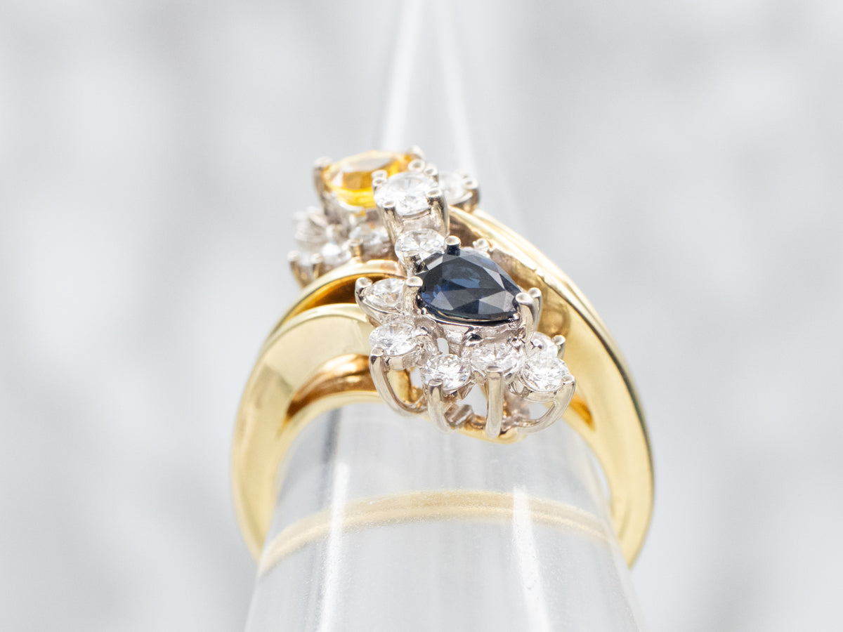 Anillo Bypass de zafiro azul y amarillo con halos de diamantes