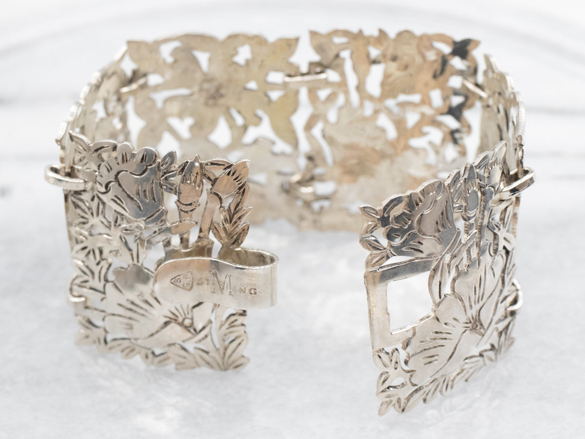 Pulsera vintage de eslabones con panel grabado floral en plata de ley