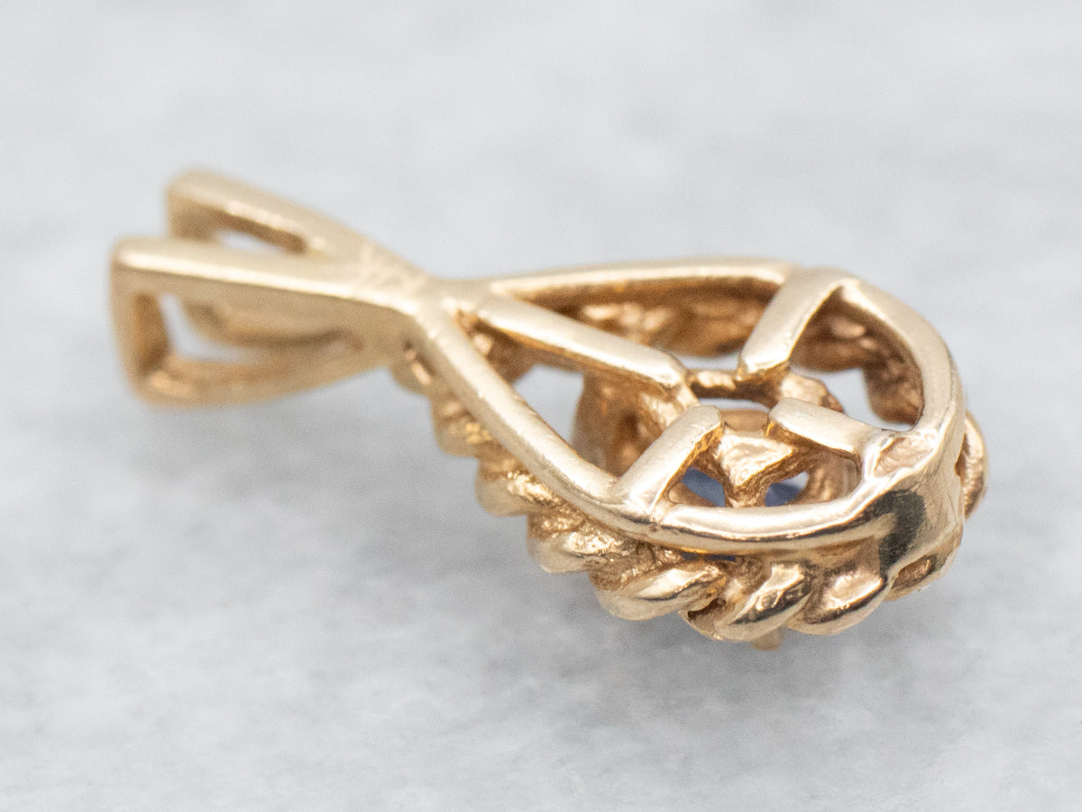 Colgante con solitario de zafiro y oro en forma de lágrima