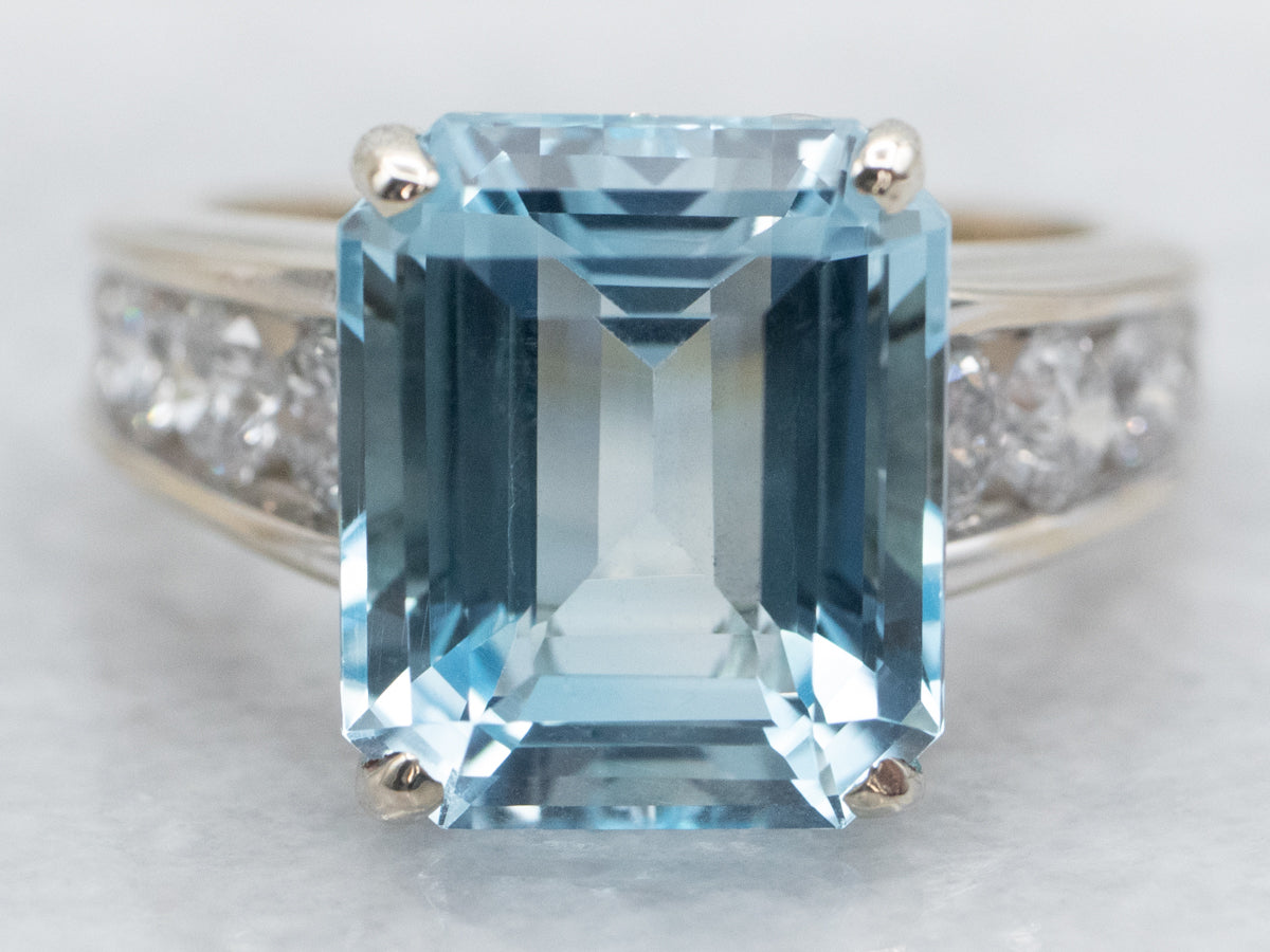 Blue Topaz and Channel Set Diamond Ring
