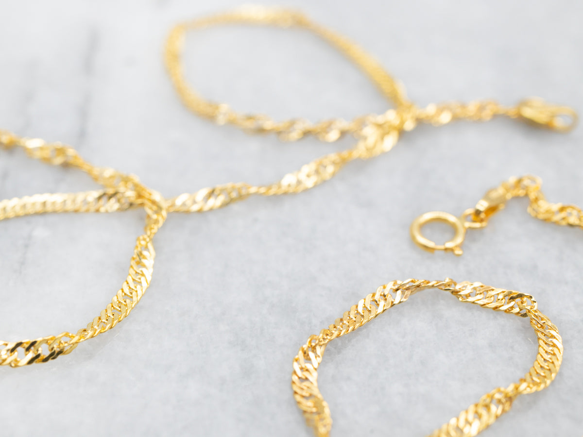 Cadena Singapur de oro de 18 quilates con cierre de anilla