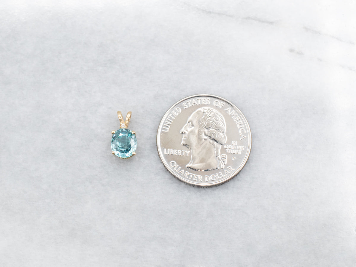 Yellow Gold Blue Zircon Pendant with Diamond Accent