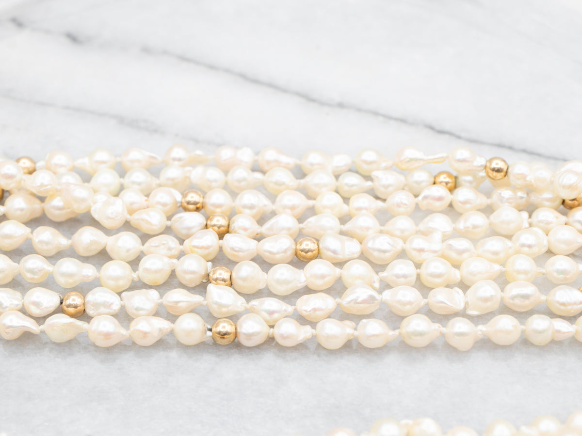 White Freshwater Pearl Eight-Strand Gold Beaded Necklace