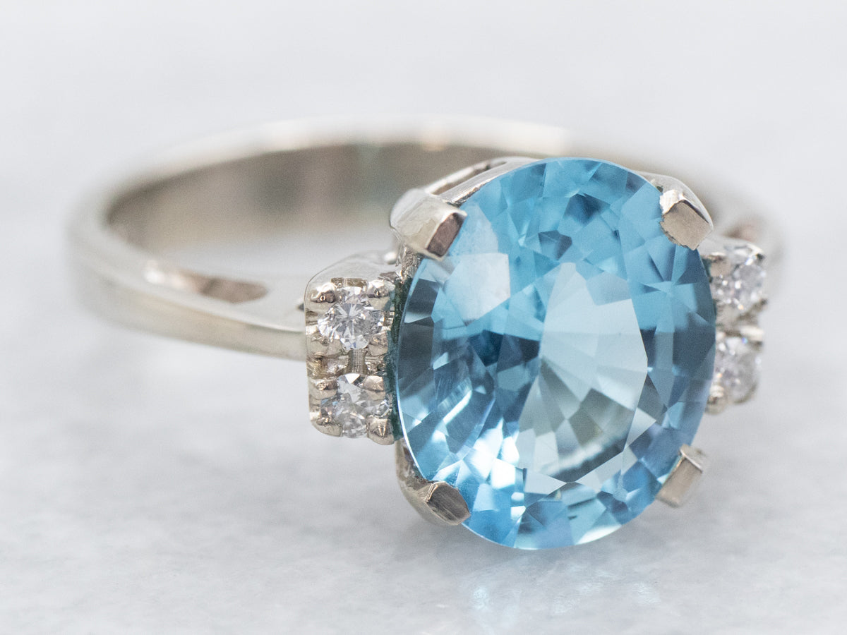White Gold Blue Topaz Ring with Diamond Accents