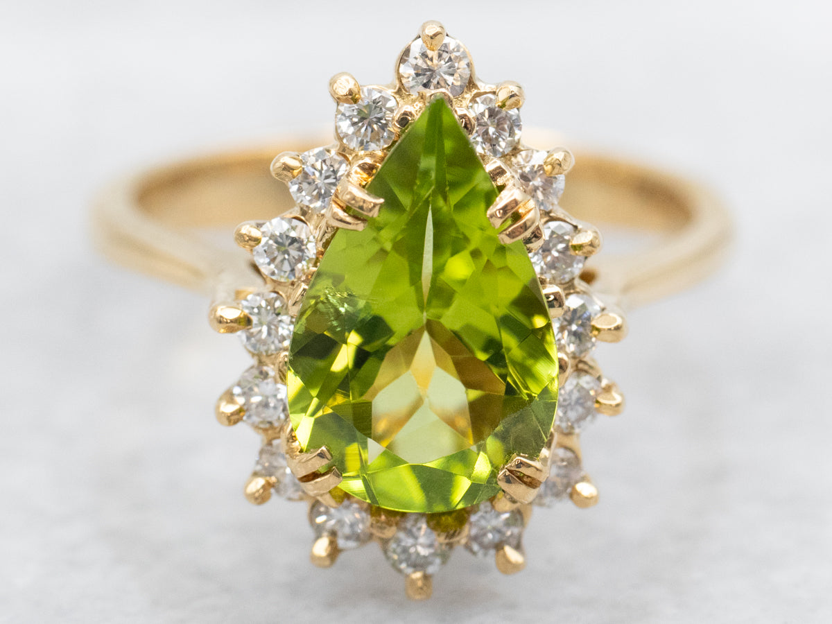 Modern Peridot Ring with Diamond Halo