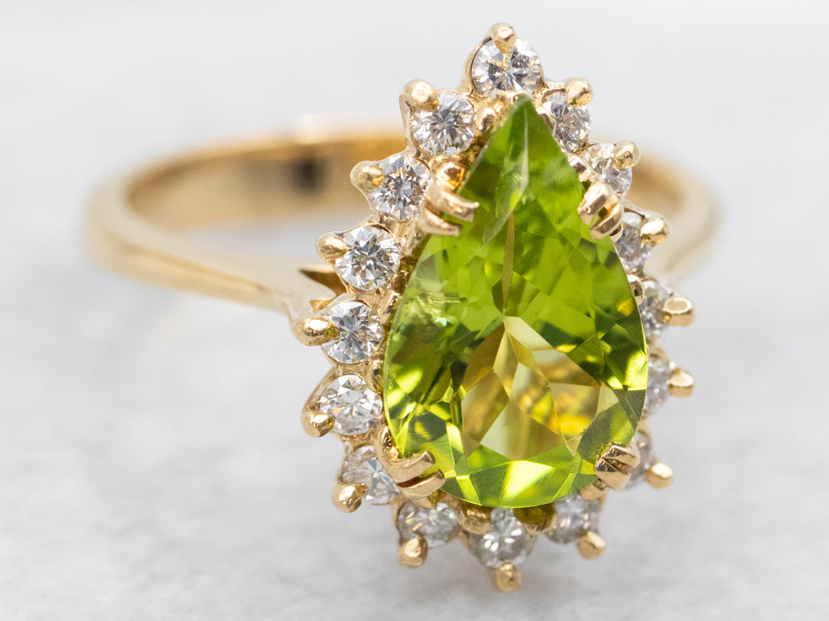 Modern Peridot Ring with Diamond Halo