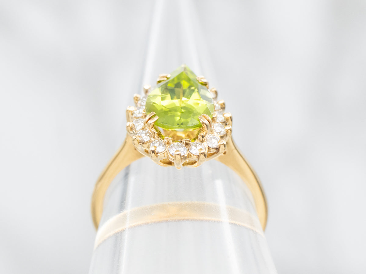 Modern Peridot Ring with Diamond Halo