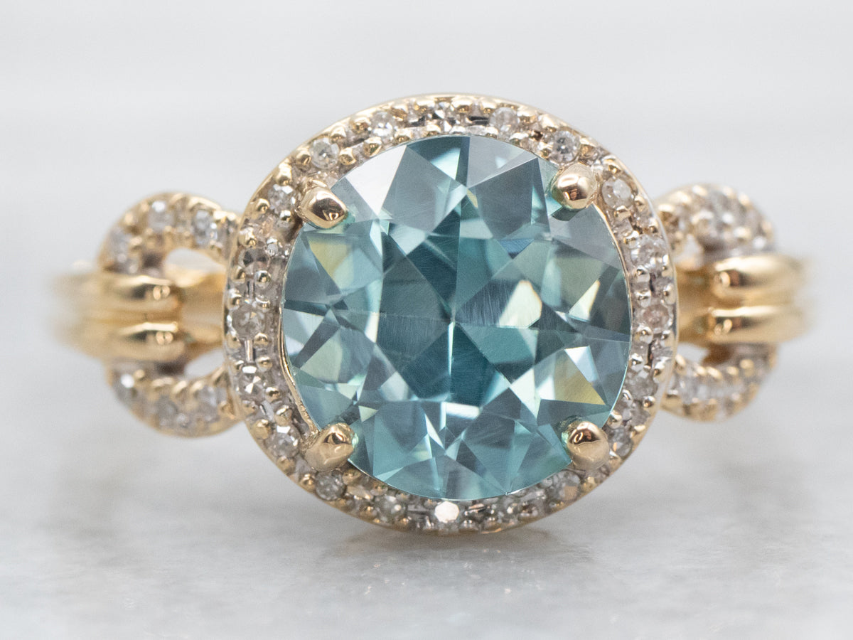 Blue Zircon Ring with Diamond Halo