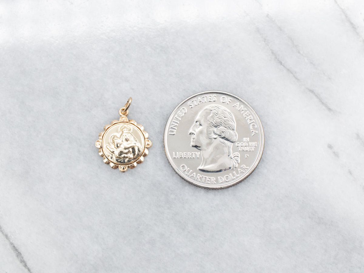 Medallón religioso de la Virgen y el Cristo