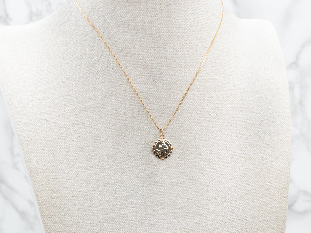 Medallón religioso de la Virgen y el Cristo