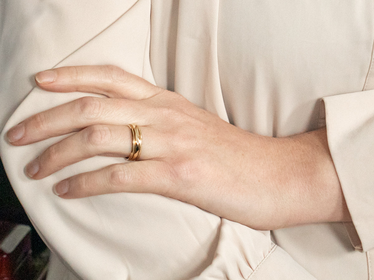 Yellow Gold Wedding Band with Faceted Center and Milgrain Edge