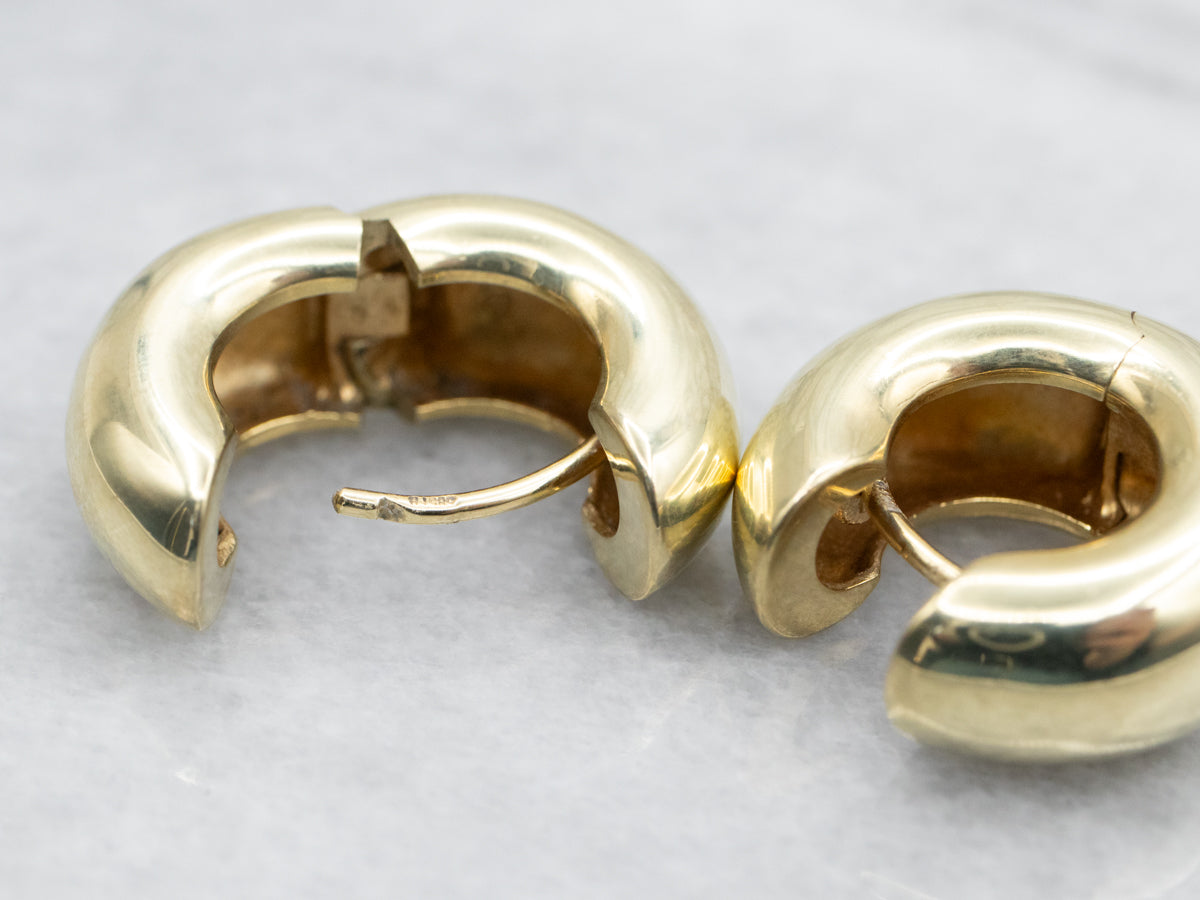 Pendientes de aro Huggie anchos de oro amarillo