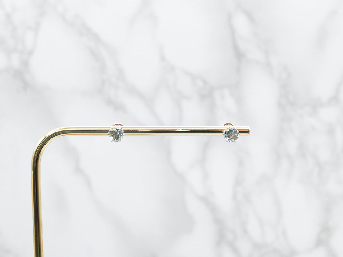 Pendientes de oro amarillo con topacio azul