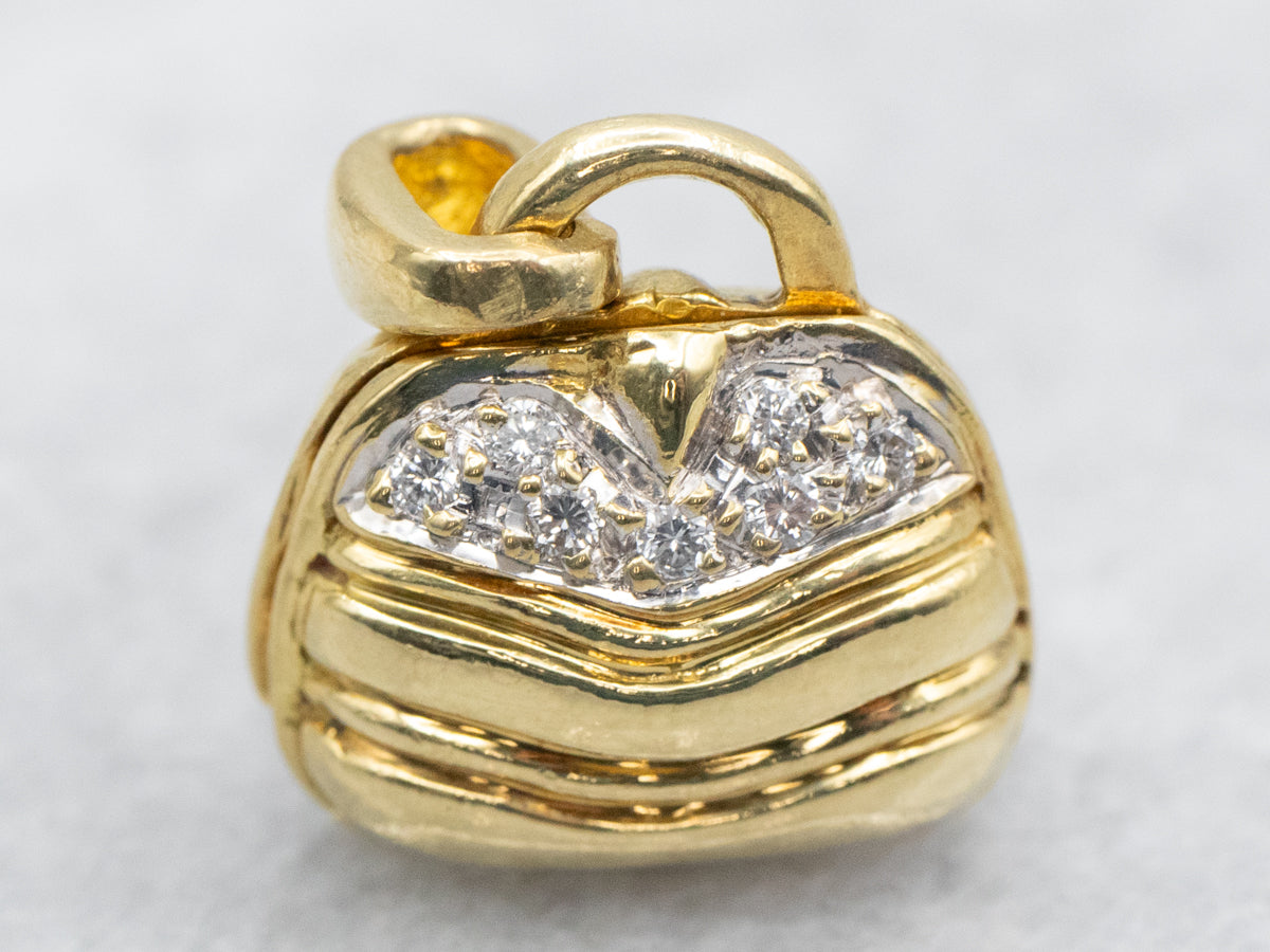 Charm para bolso con apertura de diamantes en oro amarillo