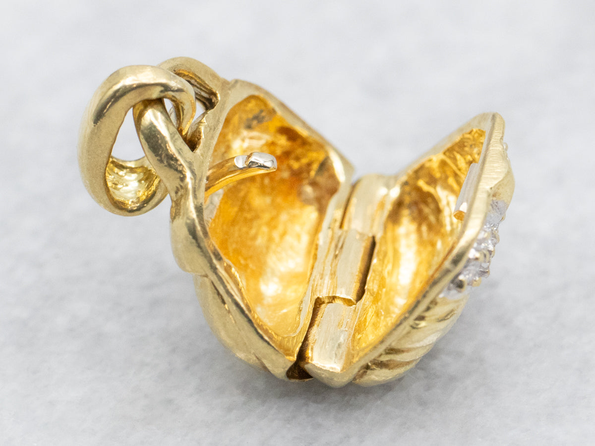 Charm para bolso con apertura de diamantes en oro amarillo