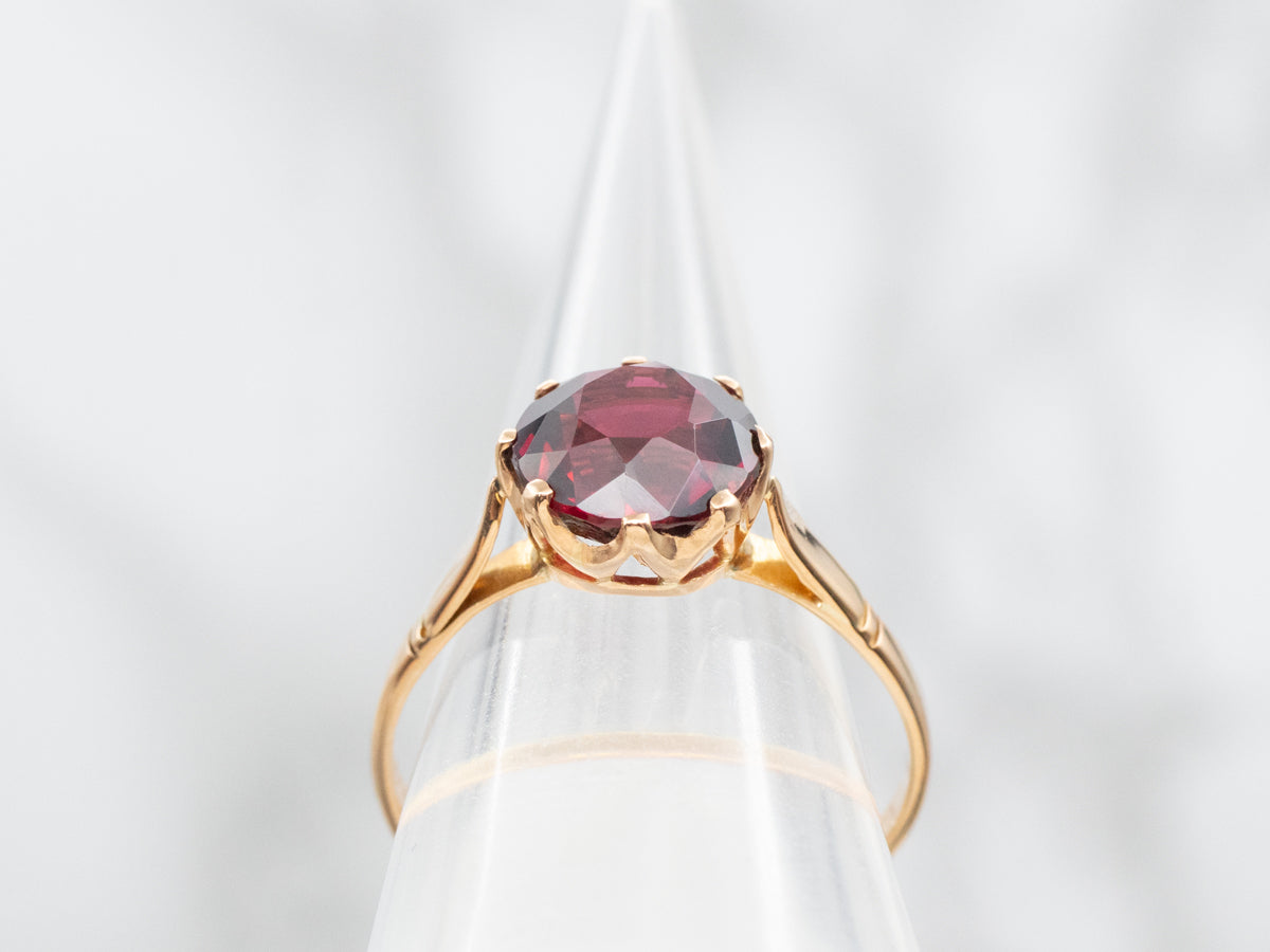Garnet Solitaire Ring set in Vintage Gold Mounting