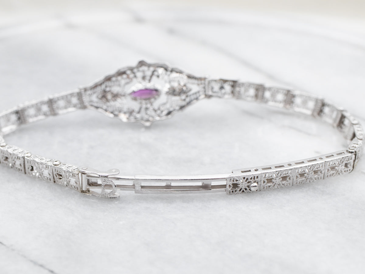 Pulsera de oro blanco con granates rodolita y filigrana de diamantes