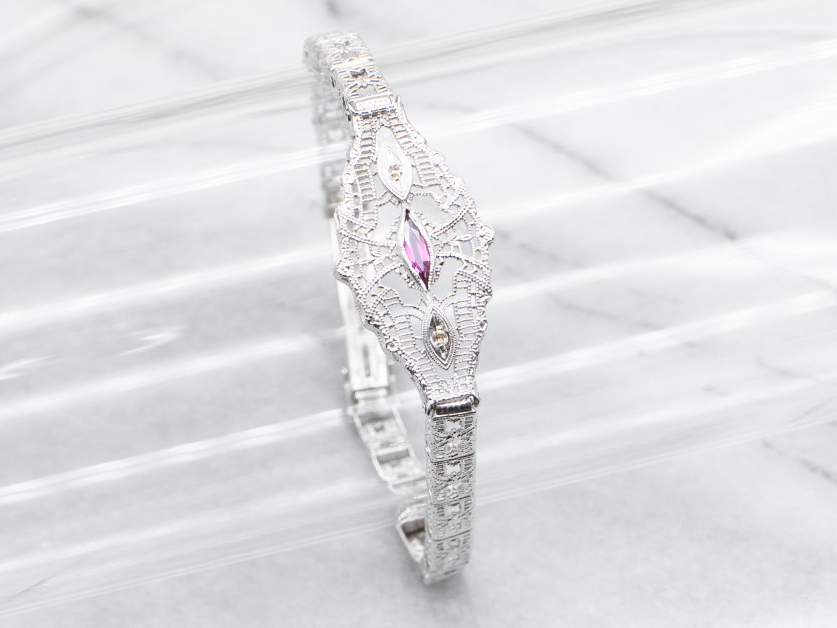 Pulsera de oro blanco con granates rodolita y filigrana de diamantes