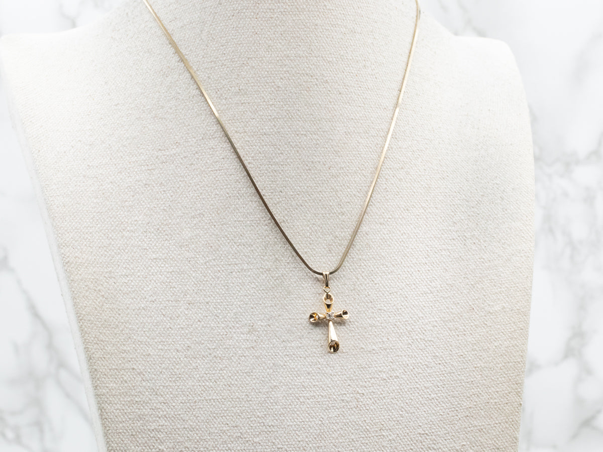 Gold Cross Pendant with Diamond Accent