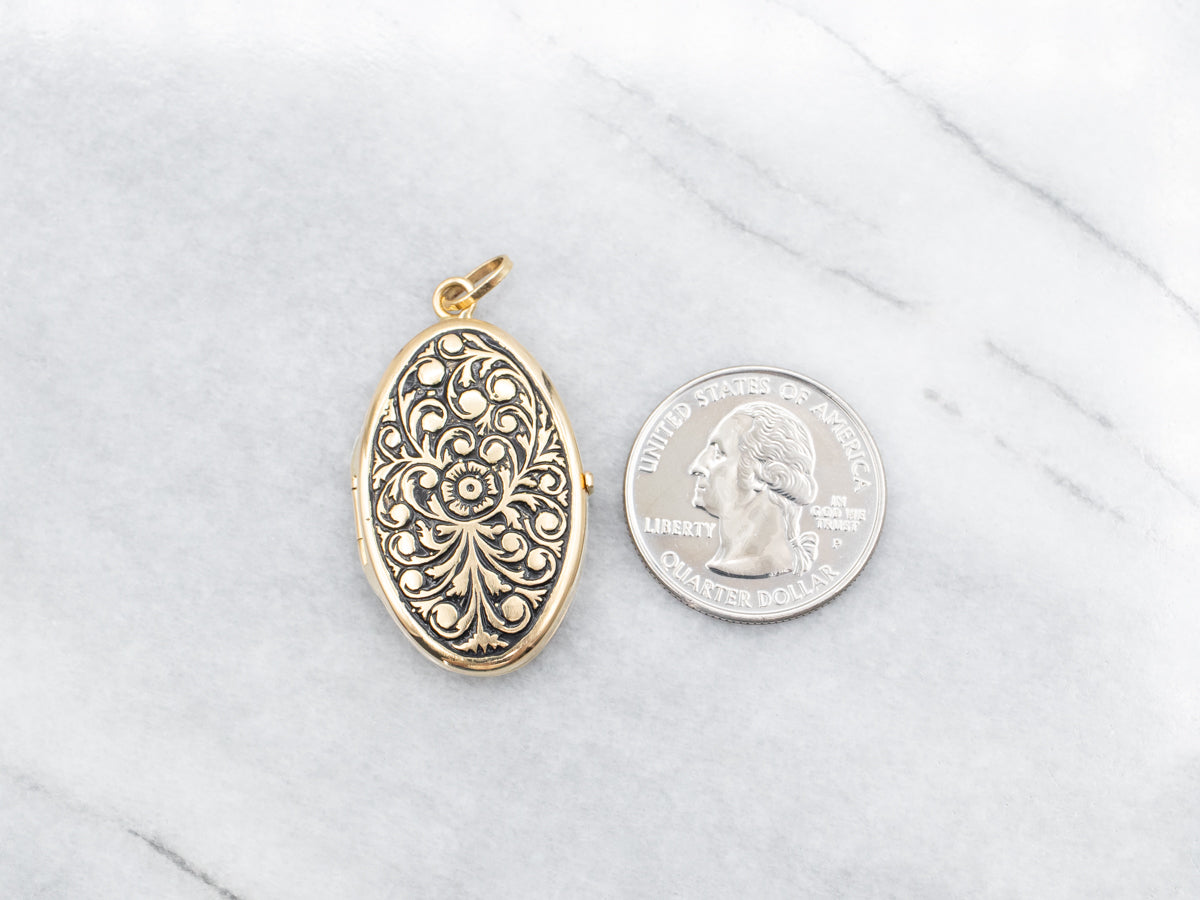 Oval 18-Kart Gold Locket with Scrolling Botanical Design