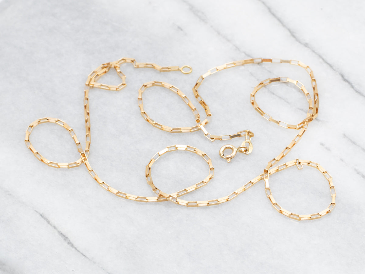 Cadena de eslabones rectangulares de oro amarillo con cierre de anillo de resorte