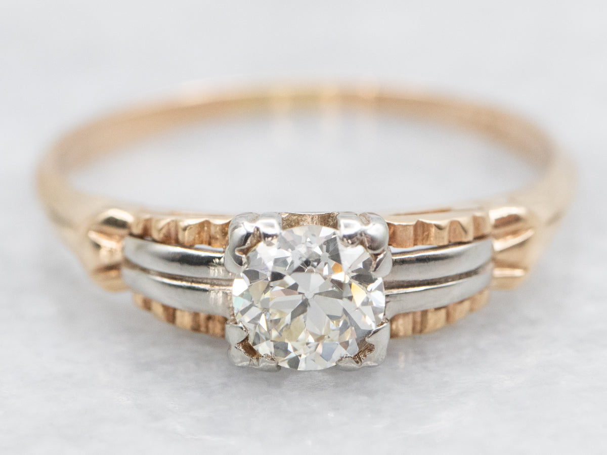 Anillo de compromiso de diamantes de talla europea de la era retro