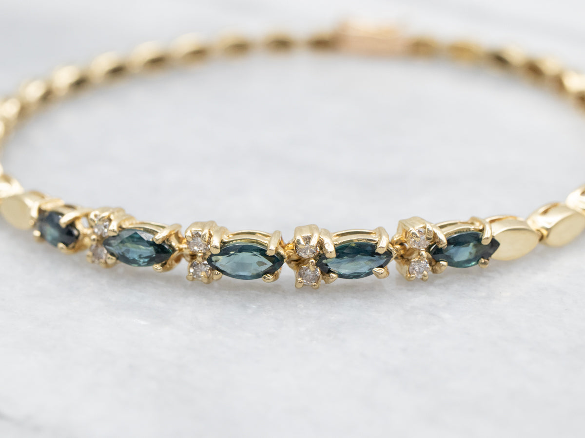 Pulsera de oro amarillo con zafiros y diamantes