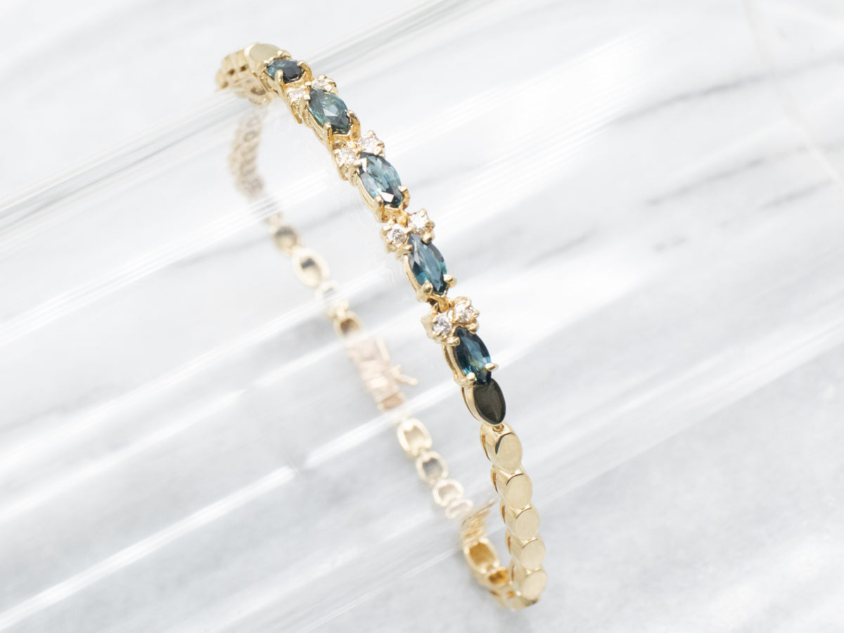 Pulsera de oro amarillo con zafiros y diamantes