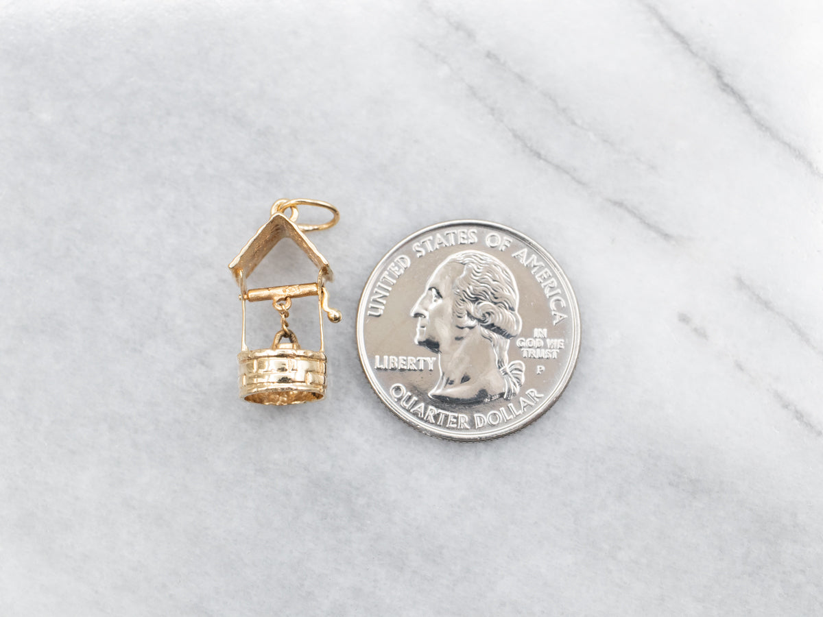 Dije de pozo de los deseos de oro