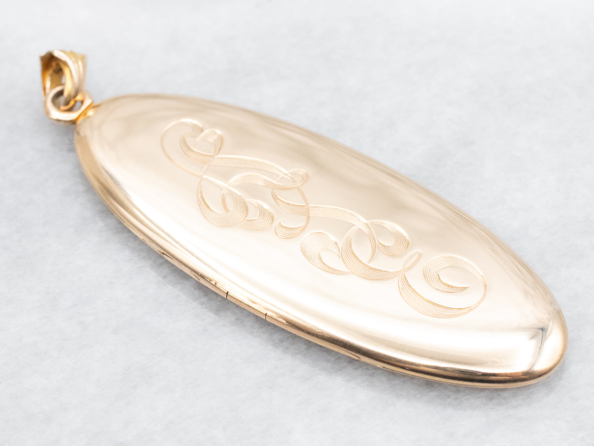 Gold "ATE" Engraved Elongated Oval Locket