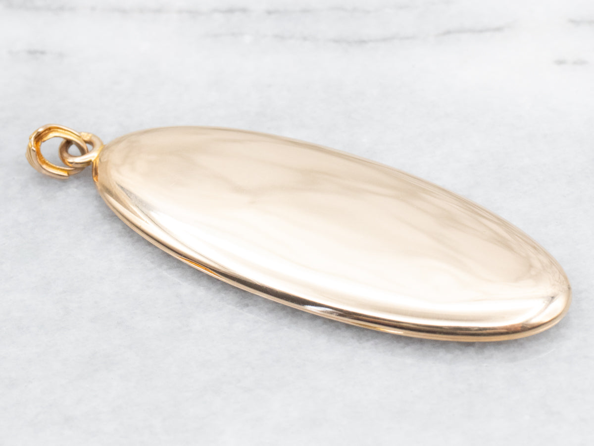 Gold "ATE" Engraved Elongated Oval Locket