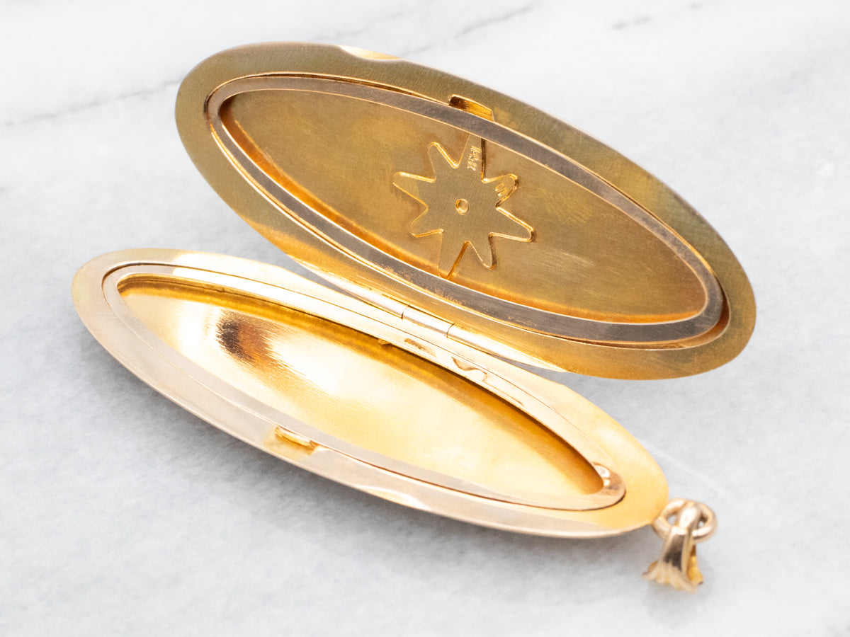 Gold "ATE" Engraved Elongated Oval Locket