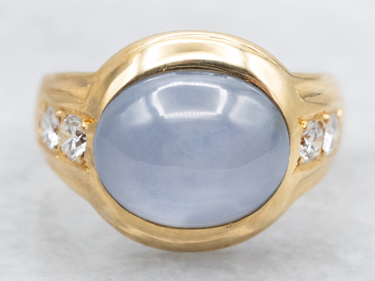 Blue Star Sapphire and Diamond Ring in Polished Gold