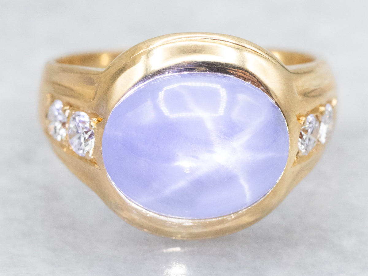 Blue Star Sapphire and Diamond Ring in Polished Gold