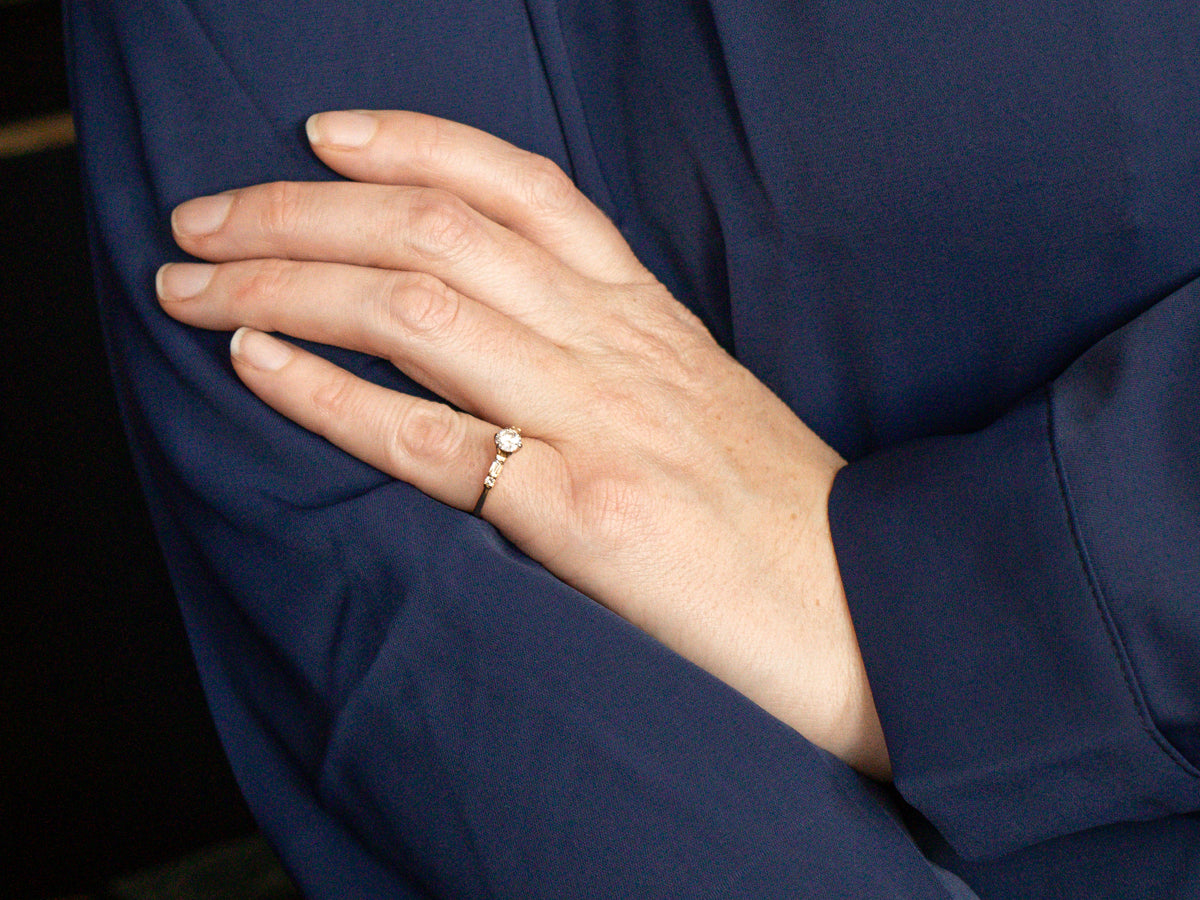 Round Brilliant and Baguette Cut Diamond Engagement Ring