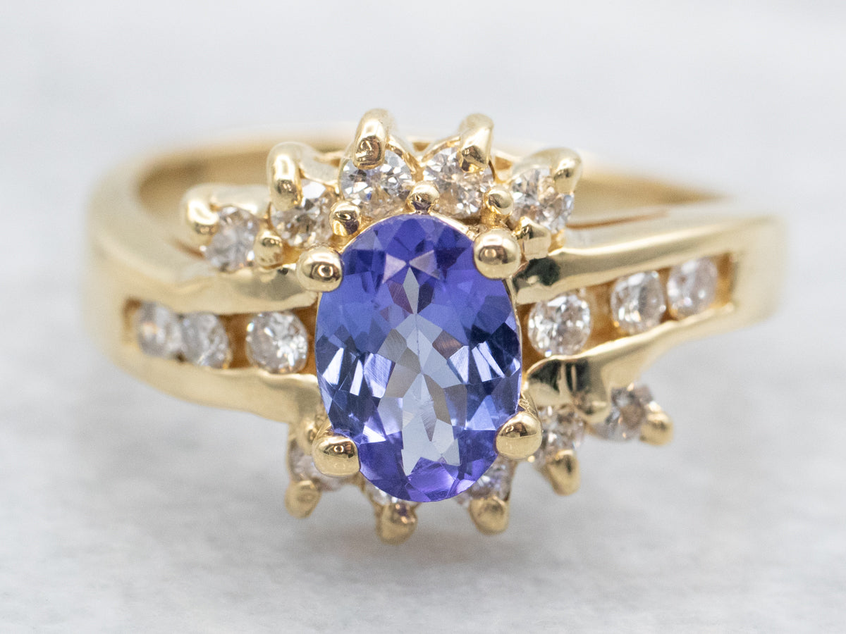 Modern Tanzanite and Diamond Halo Ring